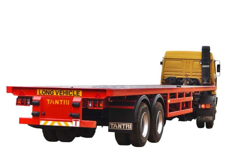 Flat Bed Trailers - TANTRI Flat Bed Trailers are designed to Handle 20ft,40ft,45ft Containers &  Loose cargo operations as well. Multi Purpose Flat Bed Trailers are suitable for both the Ports & Roads
